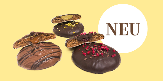 Gefüllte Elisenlebkuchen von Riedmair in drei Sorten: Schoko-Himbeer, Pistazie und Salted Caramel. Feinste handgefertigte Lebkuchen mit Schokoladenüberzug und cremiger Füllung.